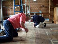 Derek 
                        & Alan on their knees